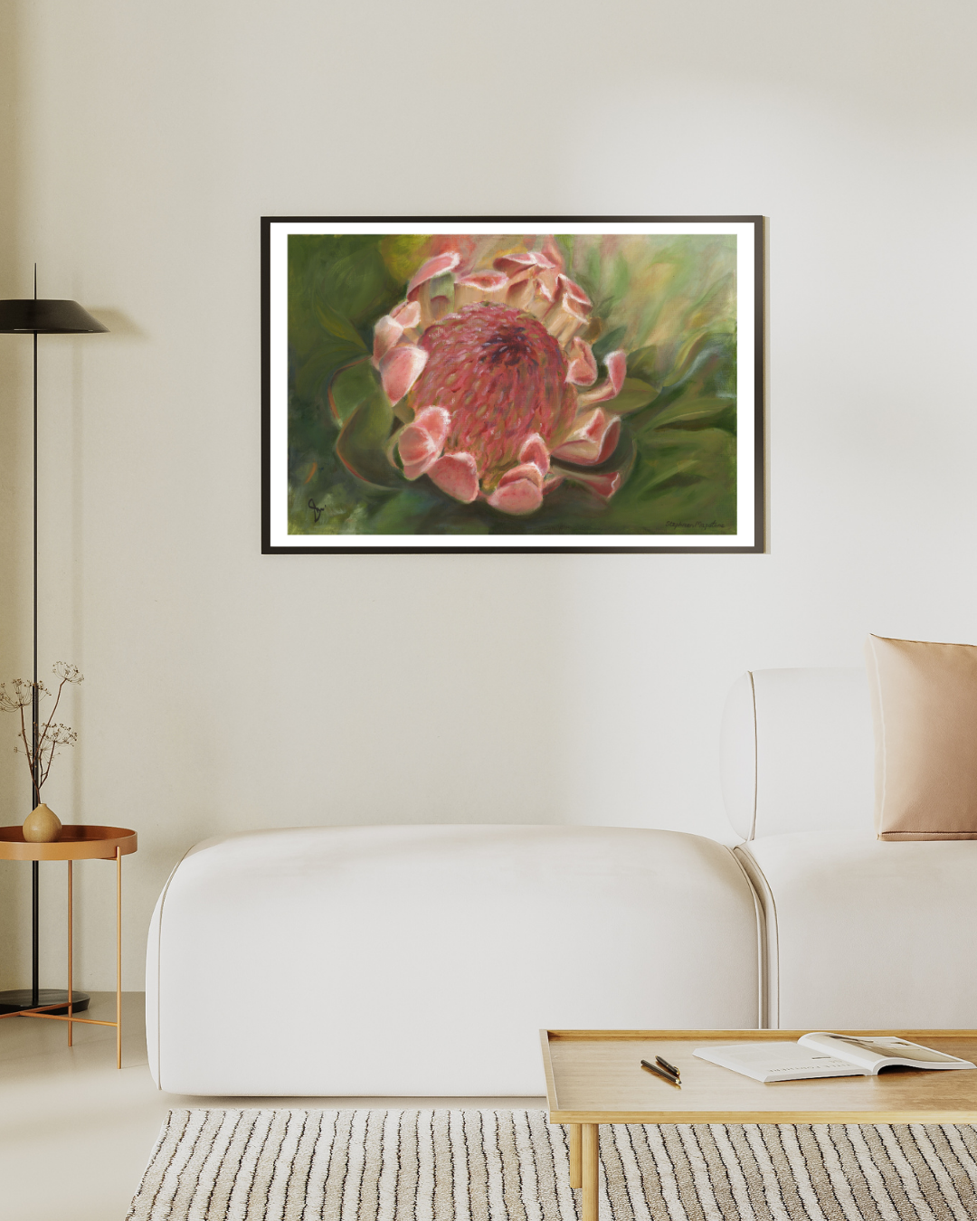 Limited edition print of ‘Queen of the Fynbos’ by Stephreen Mapstone displayed in a bright predominately white room. The bold protea artwork adds a vibrant focal point, bringing colour and elegance to the minimal, airy space.