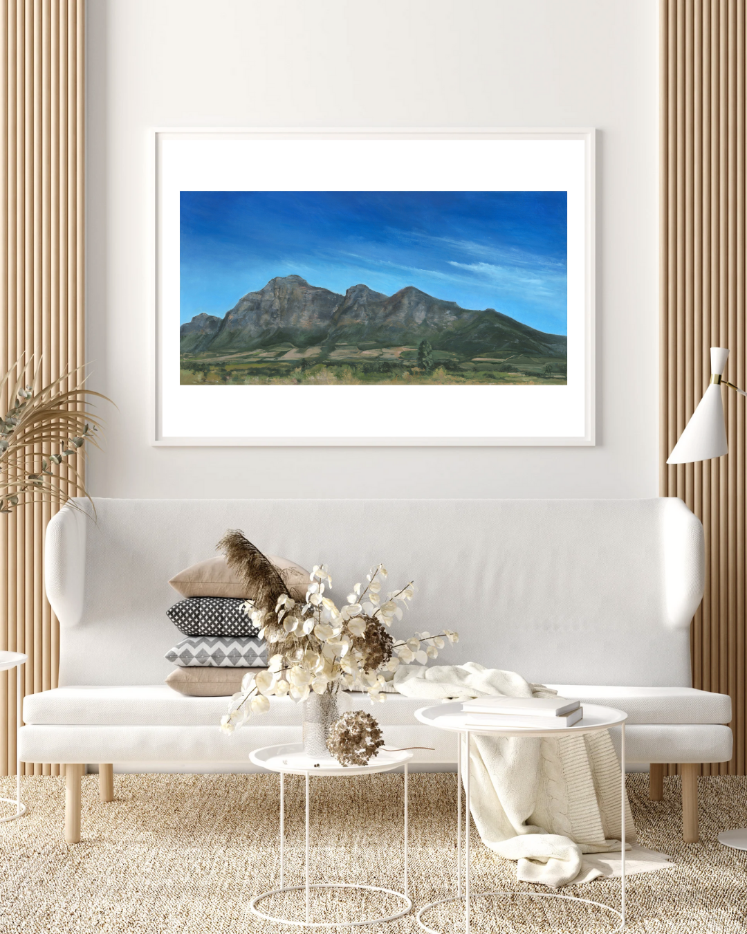 ‘Simonsberg’ limited edition print by Allison Pilling, displayed in a calm, natural-toned room. The mountain landscape adds a peaceful and grounded presence to the space.