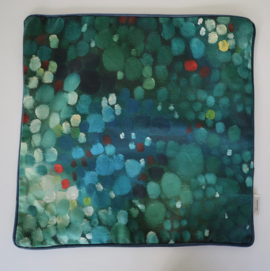 Square 60×60 cm cushion cover with abstract green and blue oil-painting print, velvet piping, velvet back, and concealed zip closure.